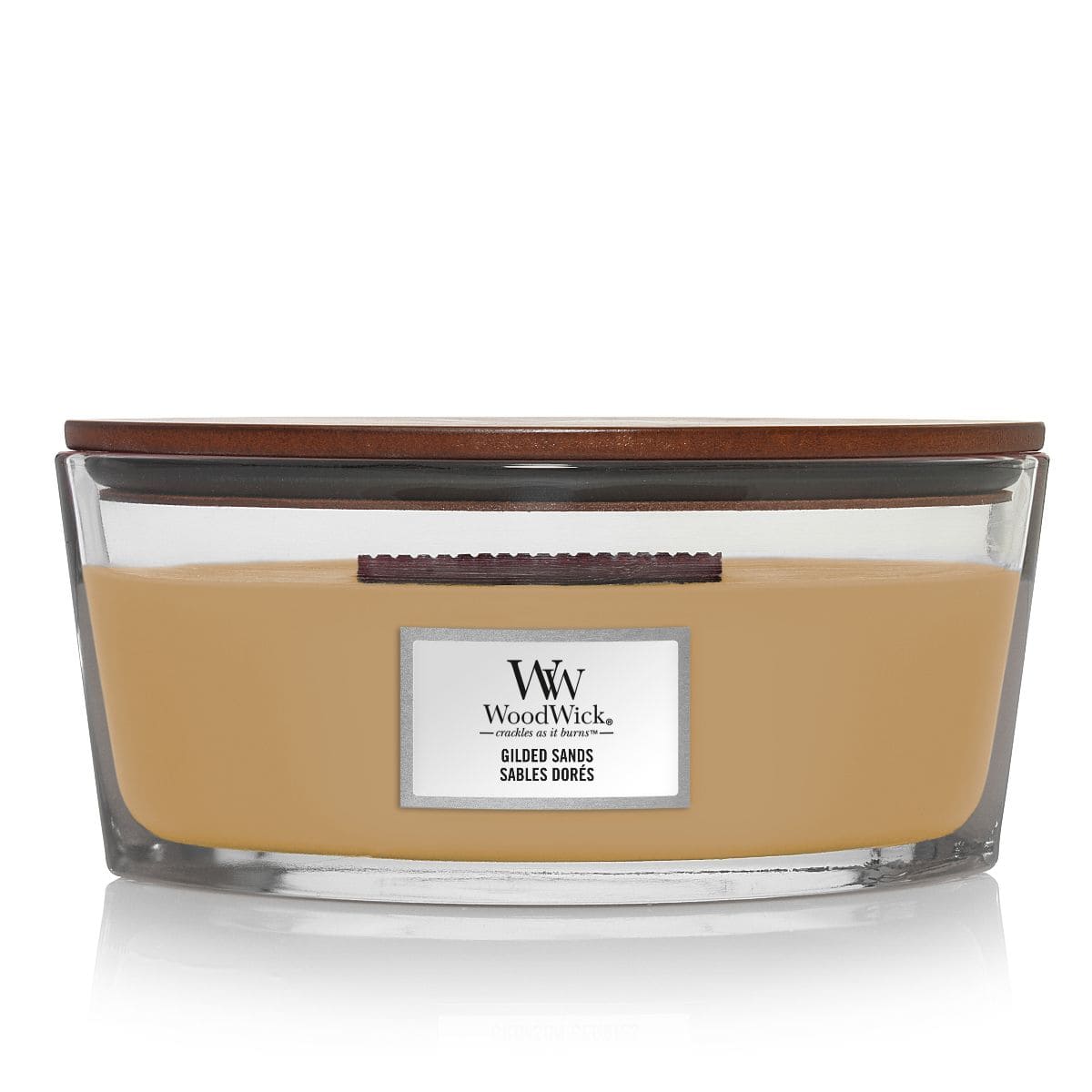 Candela WoodWick Gilded Sands con note di fico e legno di guaiaco