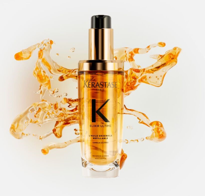 Elixir Ultime di Kérastase, l'olio per capelli che dona luminosità e nutrimento intensivo, simbolo di lusso e innovazione.