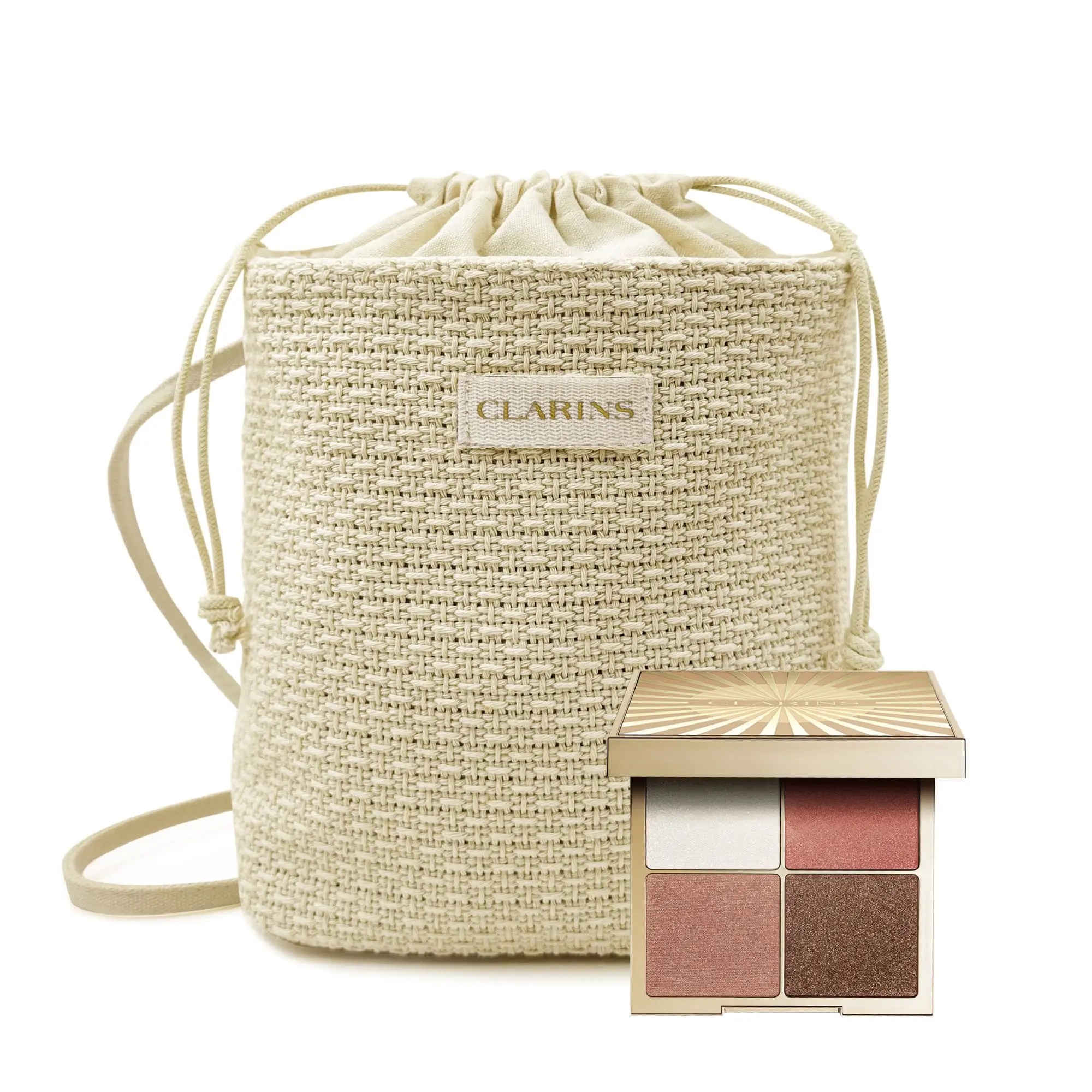 Palette make-up viso e occhi Clarins “Pro Glow” con quattro nuance complementari in secchiello color crema