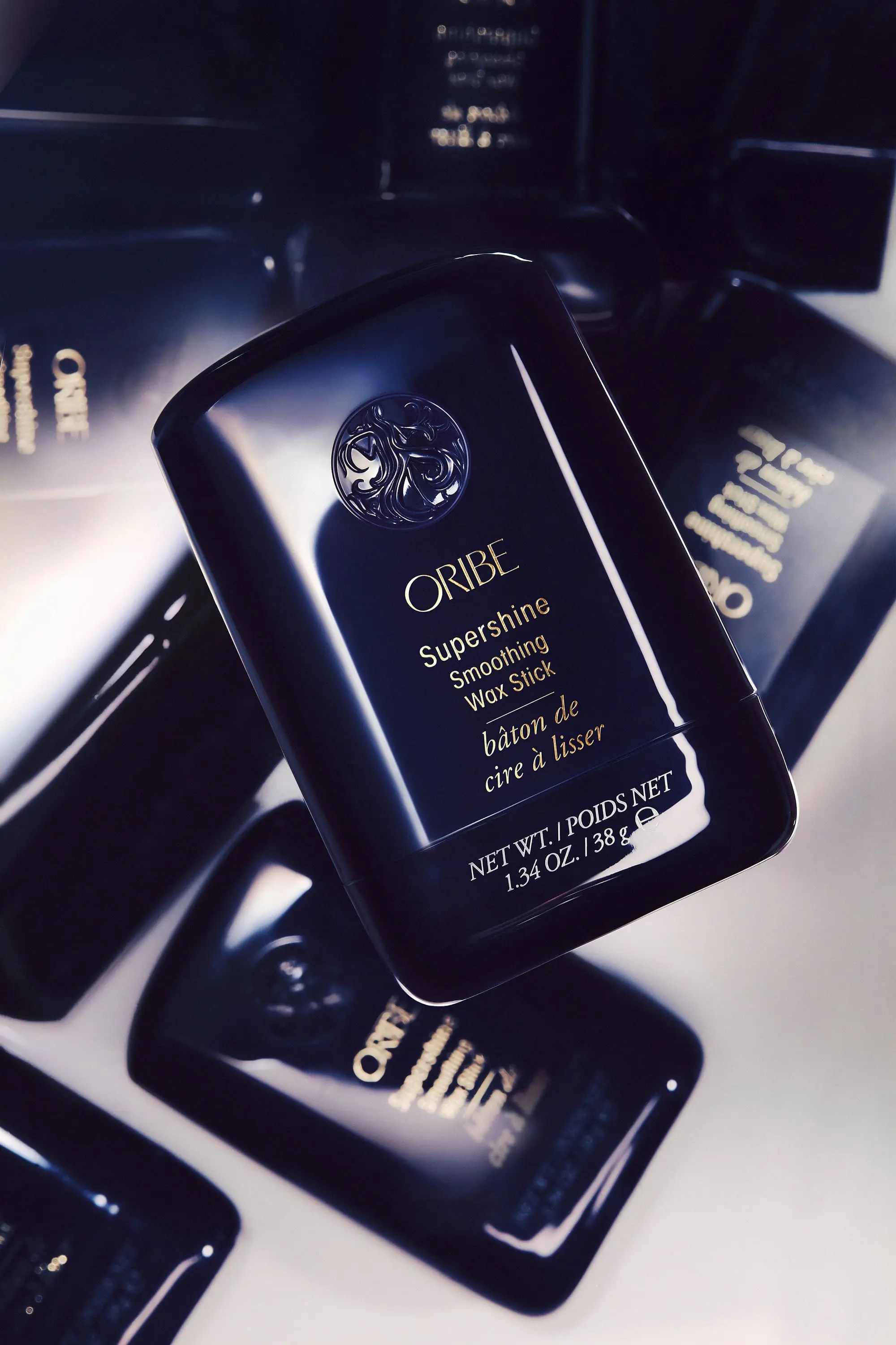 Supershine Wax Stick di Oribe per capelli lisci, disciplinati e luminosi